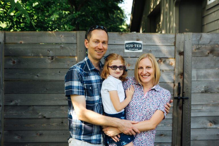 portrait of happy family, captured in an outdoor setting