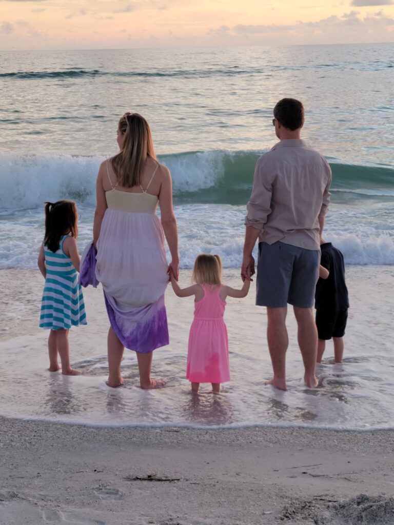 portrait of a family on the beach